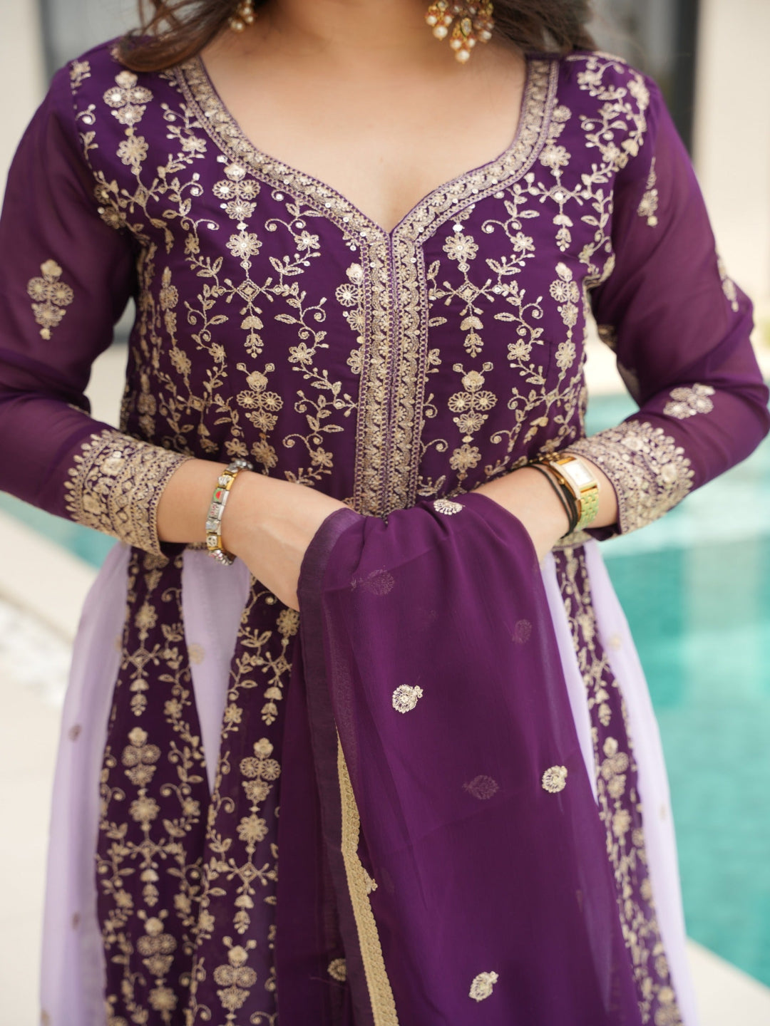 Purple embroidered traditional outfit with gold details