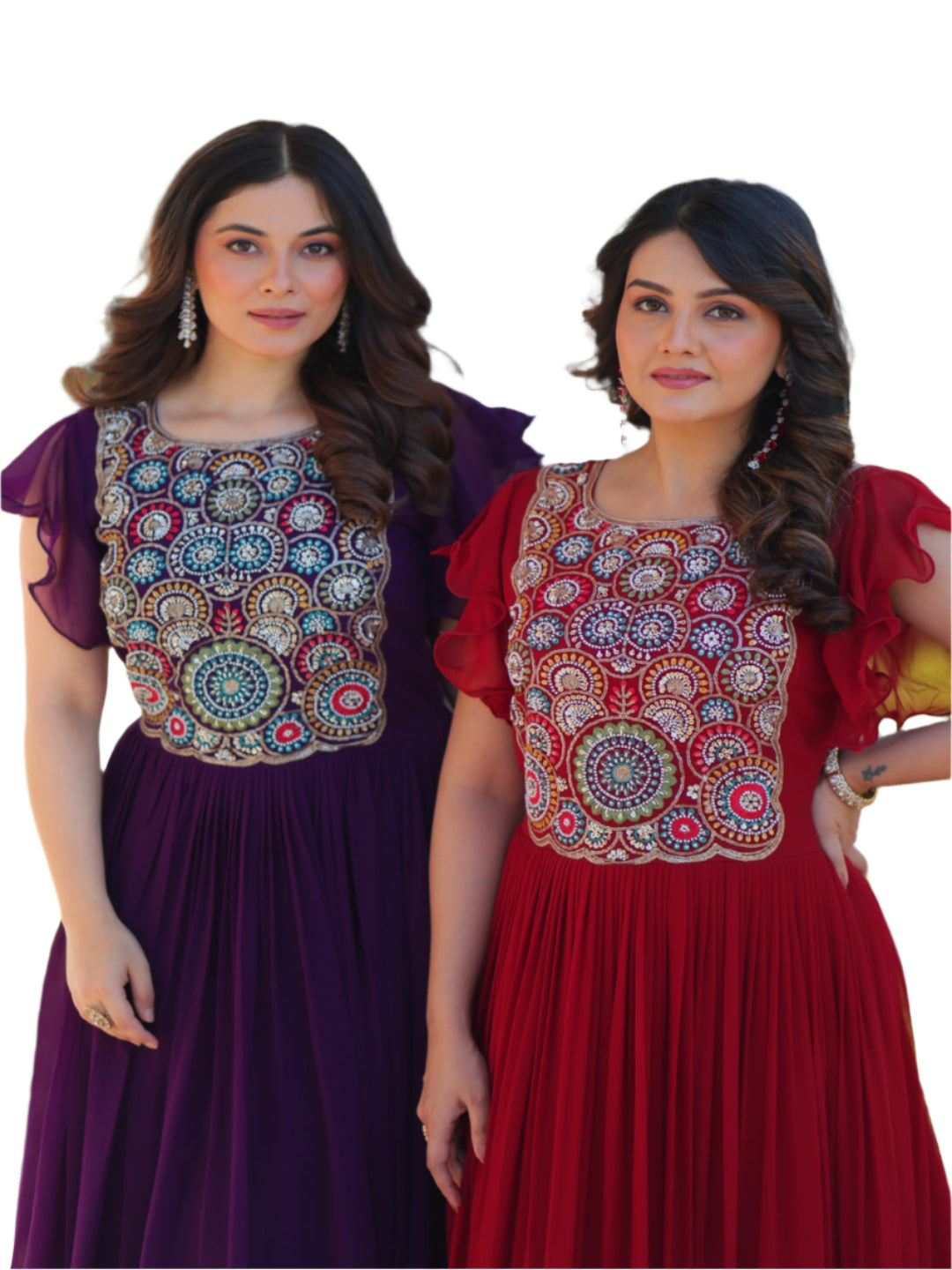 Two women in colorful embroidered dresses standing outdoors.