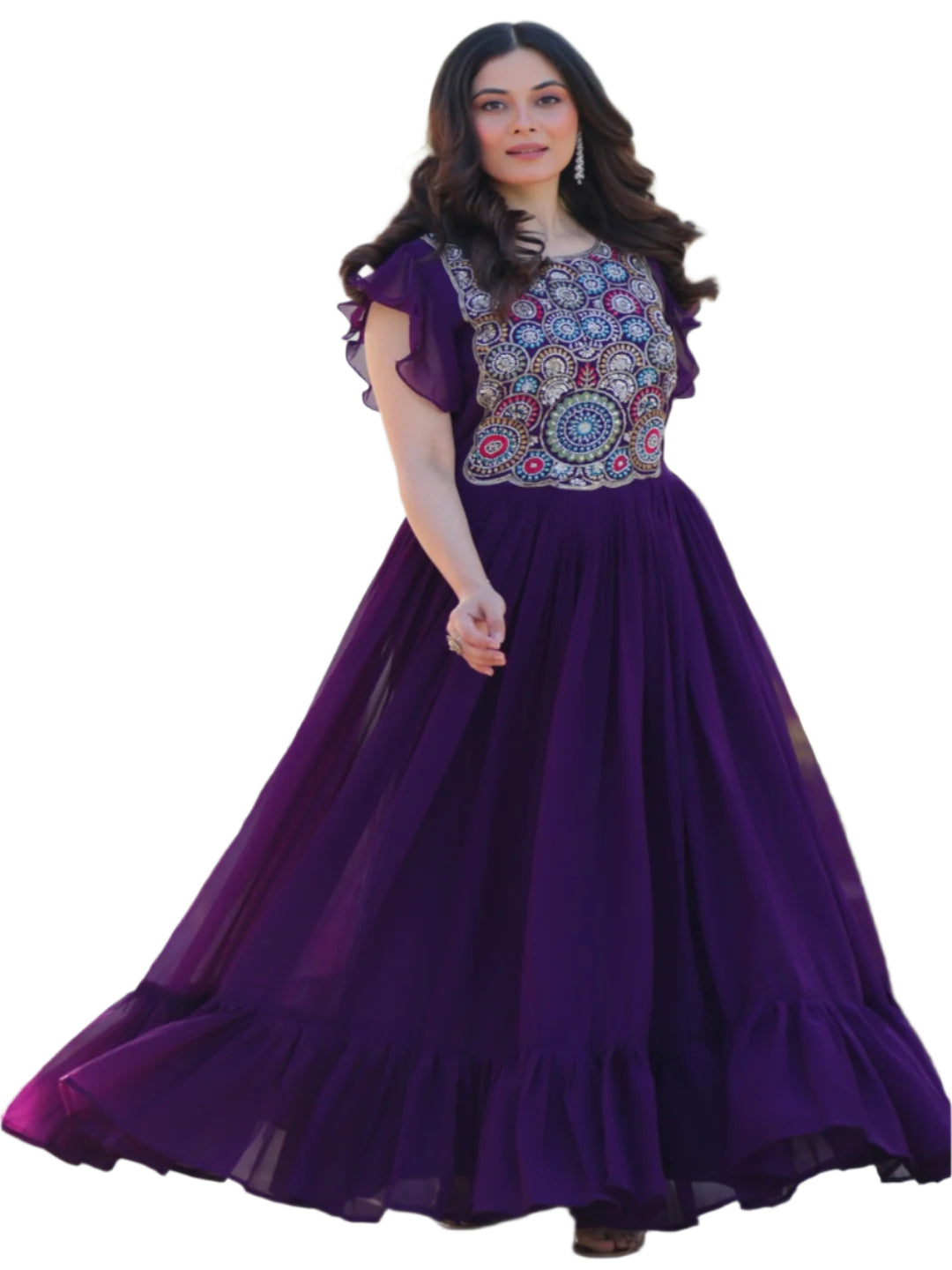Woman in a purple dress with floral top standing outdoors.