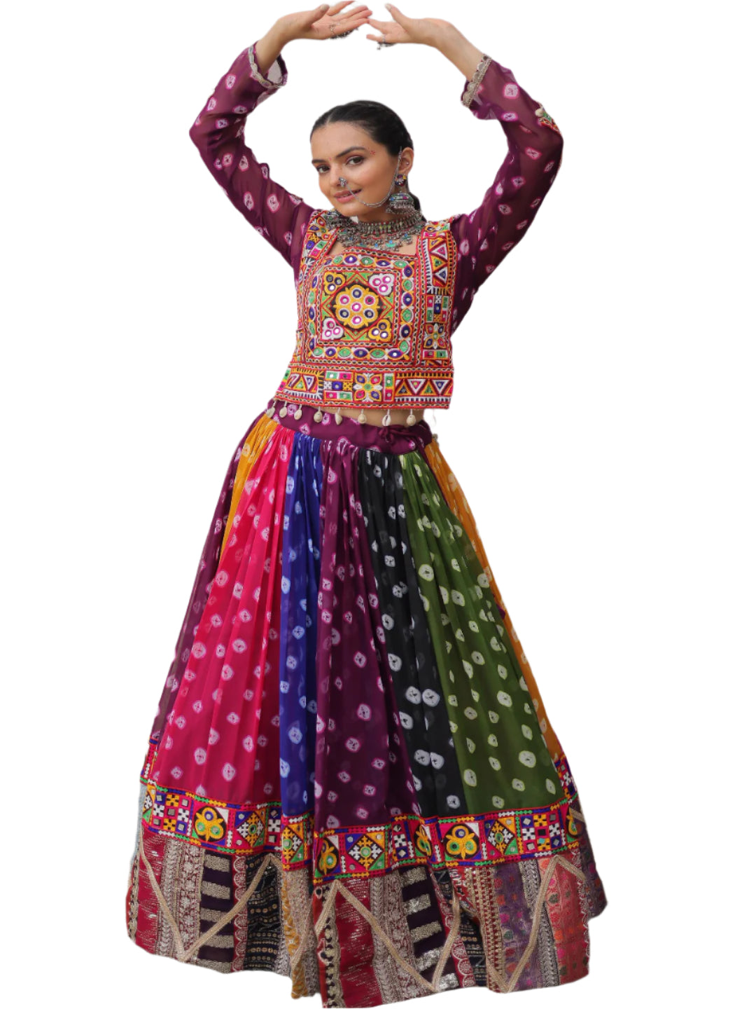 Woman in a colorful traditional outfit posing in an outdoor setting.