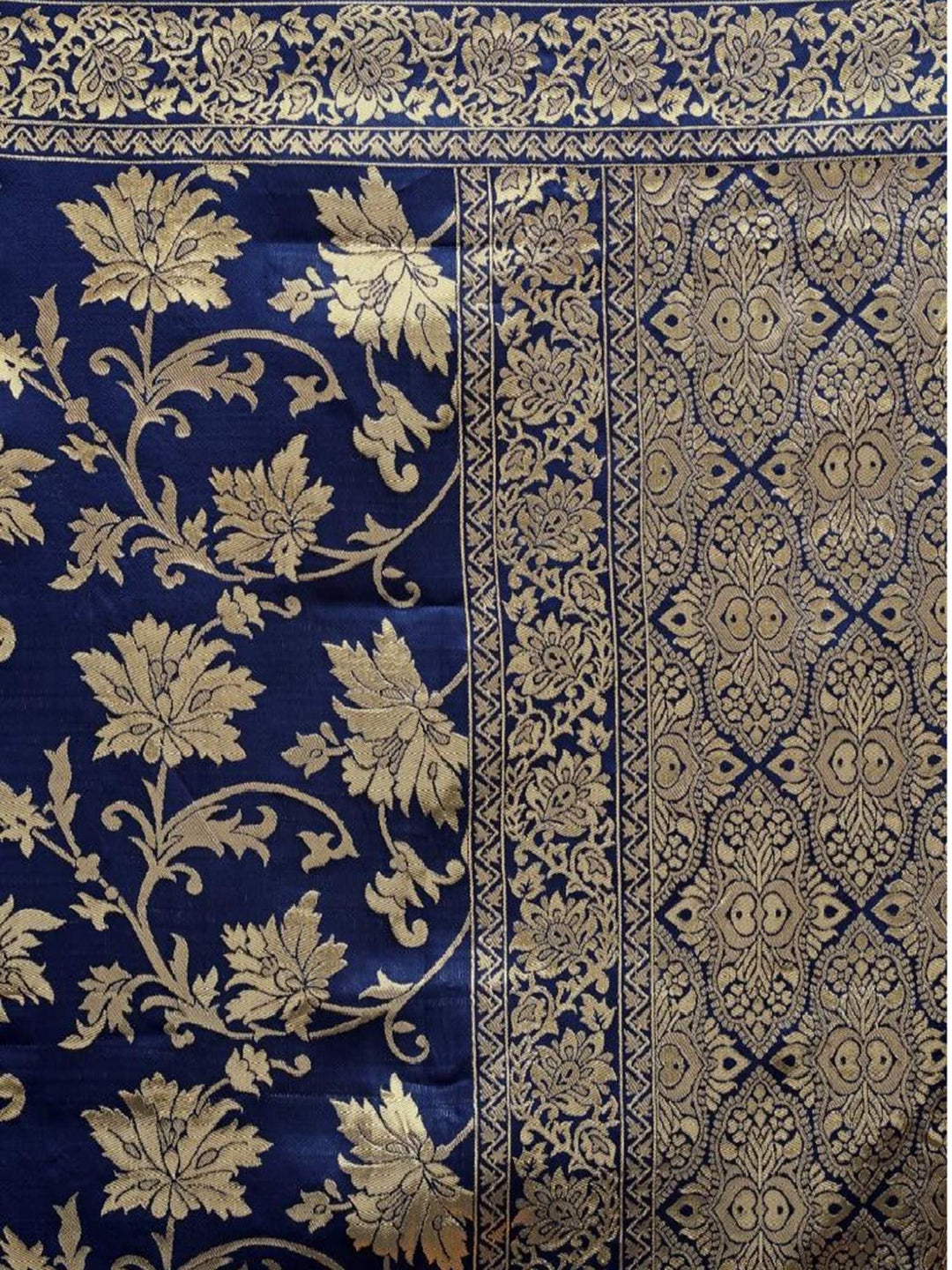 Blue fabric with gold floral and geometric patterns