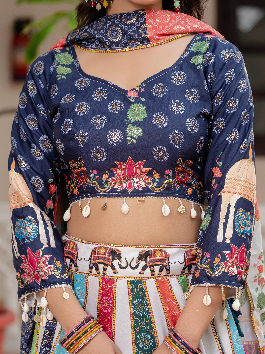 Traditional embroidered blouse with colorful patterns and designs.