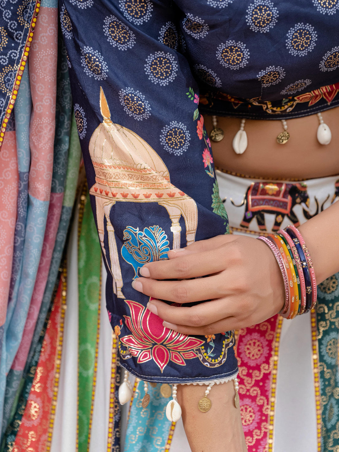 Close-up of a person wearing a colorful traditional outfit with intricate patterns.