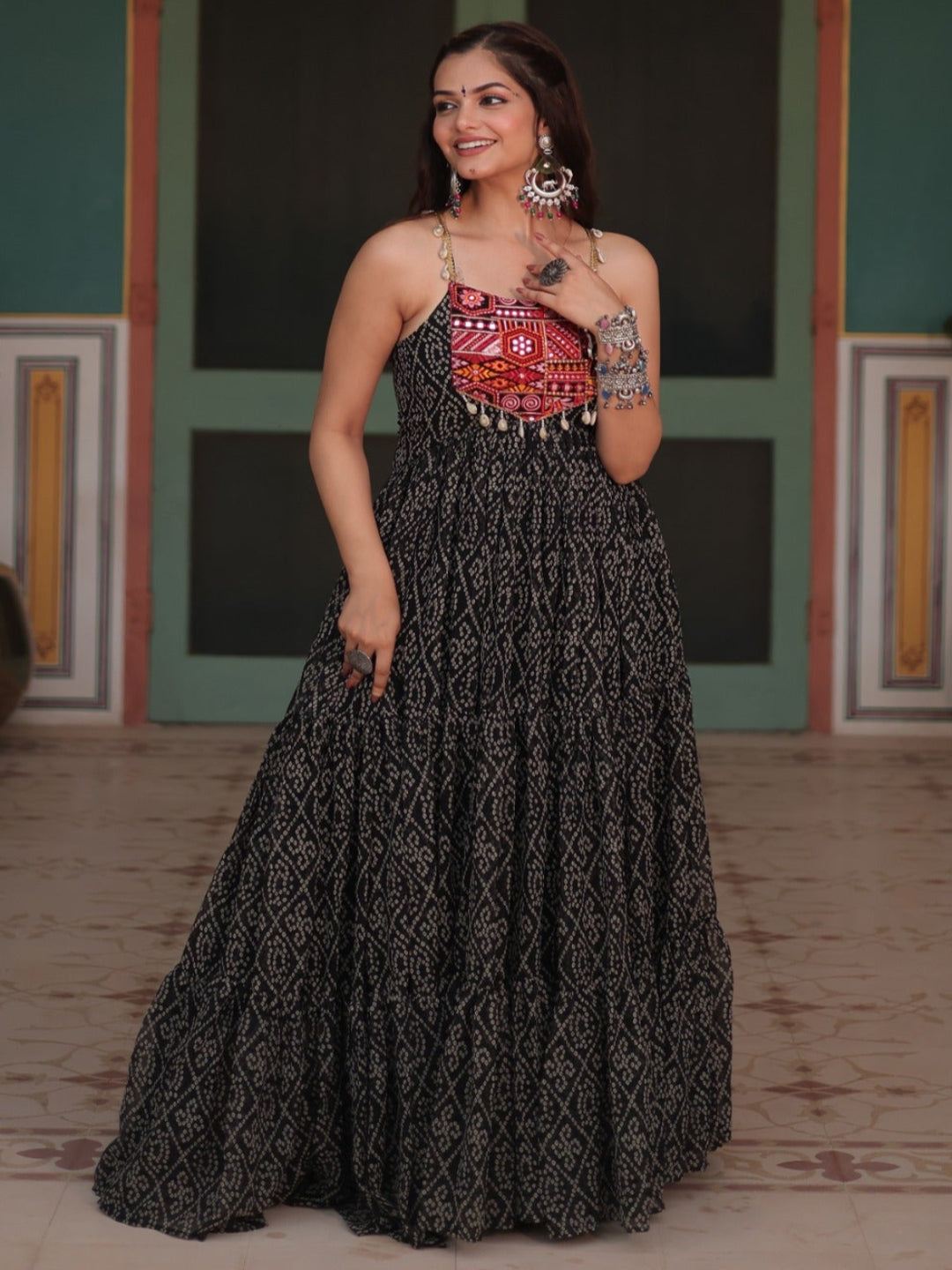 ES Bandhani Printed Sleeveless Gown with kutchi patchework in Faux Georgette.