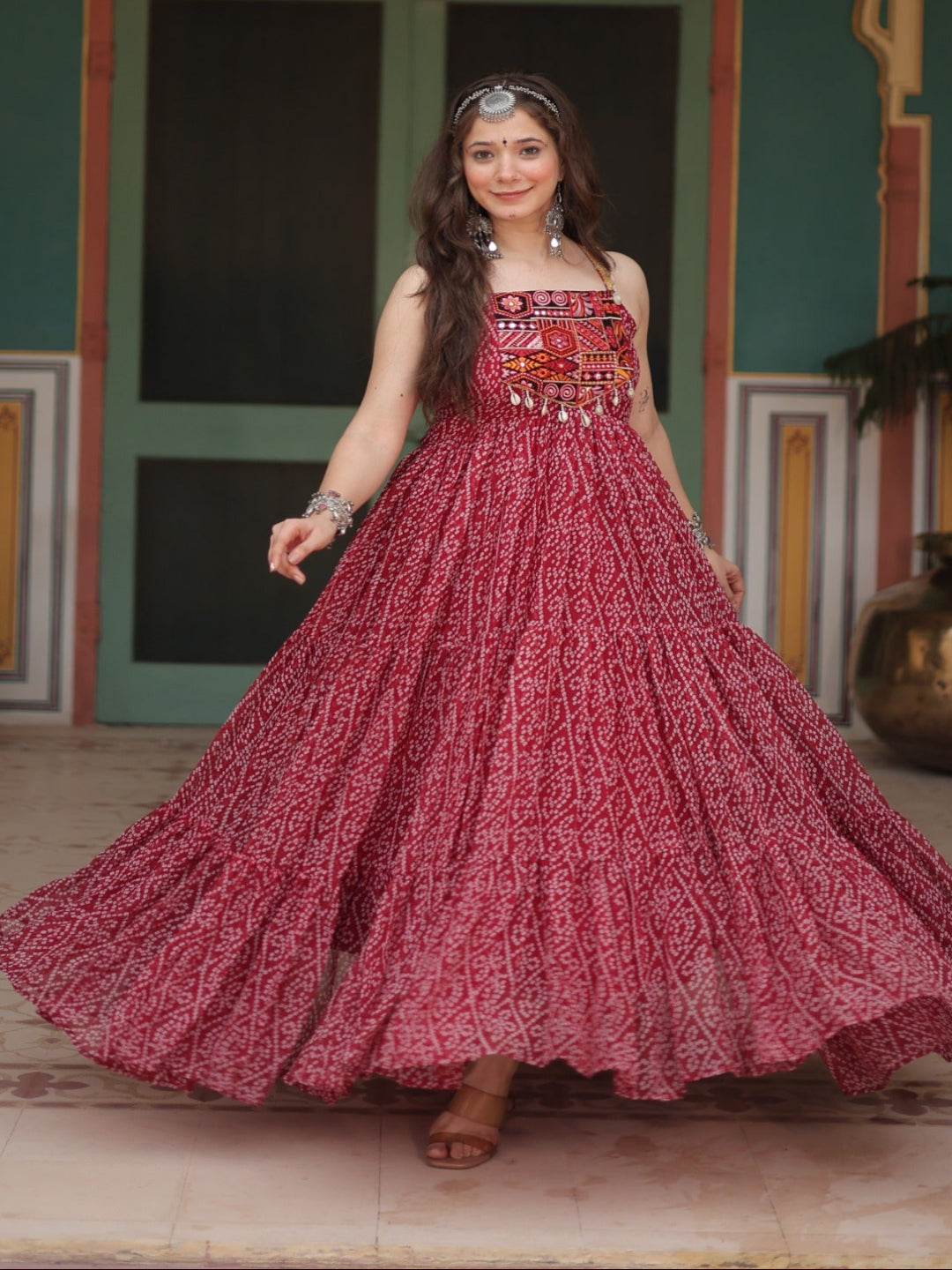 ES Bandhani Printed Sleeveless Gown with kutchi patchework in Faux Georgette.