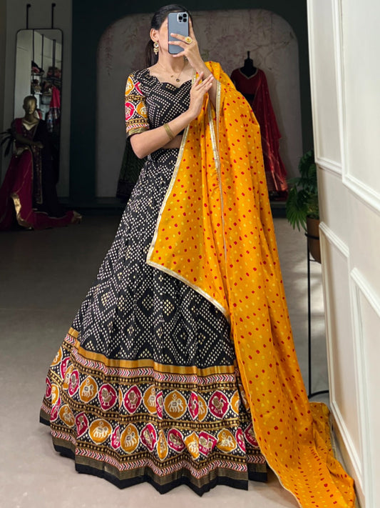 ES Tussar Silk Lehenga with Bandhej and Patola print, foil work with Blouse & Dupatta