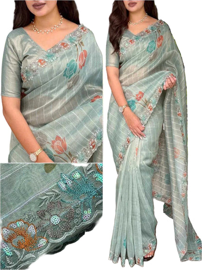 वाईएनएफ काइशा बेज ग्लास टिशू ऑर्गेंज़ा साड़ी, सीक्विन और मल्टी-कलर थ्रेड वर्क के साथ