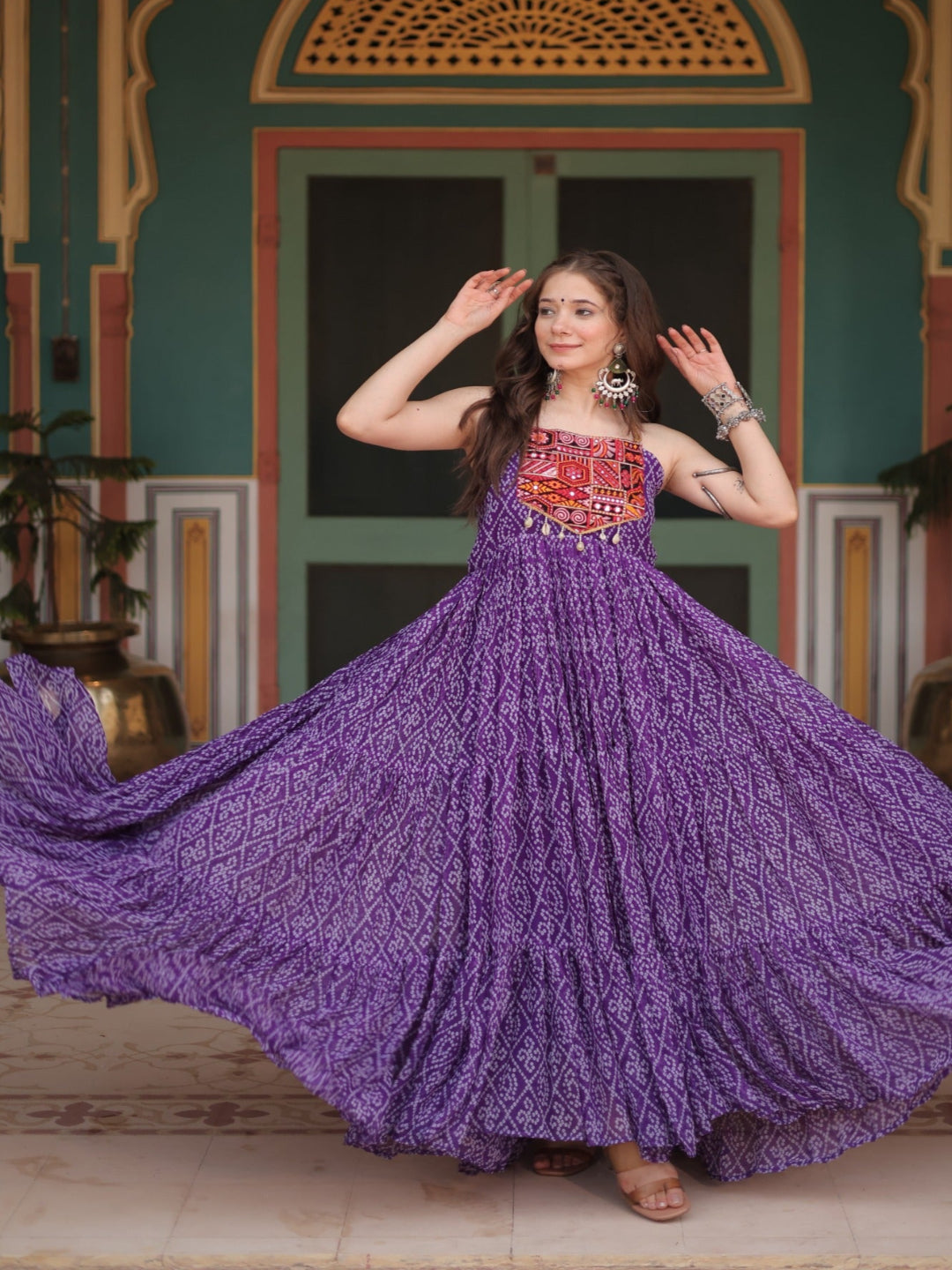 ES Bandhani Printed Sleeveless Gown with kutchi patchework in Faux Georgette.