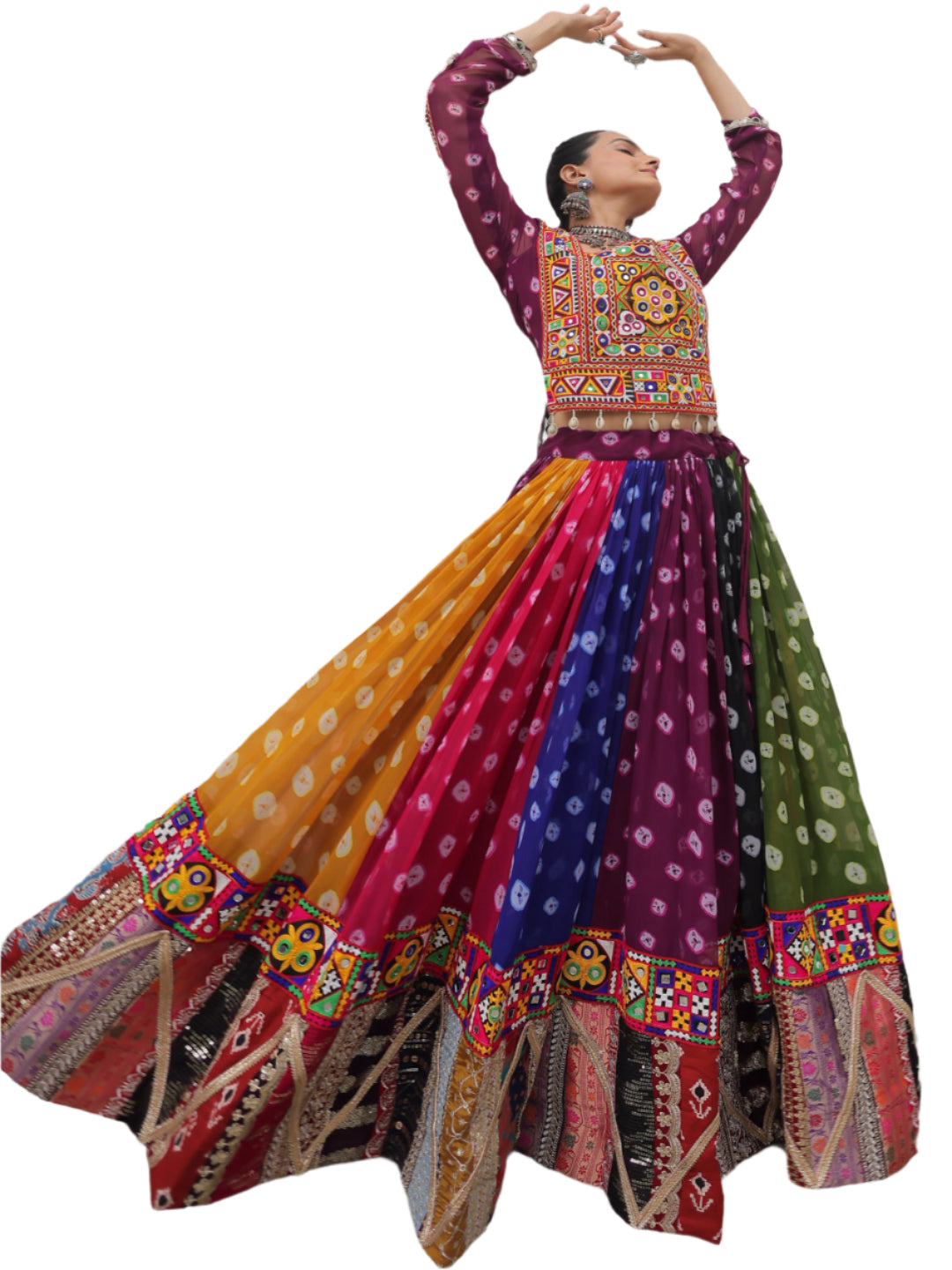 Person wearing a colorful traditional outfit with a white architectural background