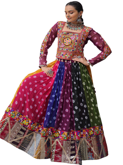 Woman wearing a colorful traditional outfit with a patterned top and multicolored skirt.