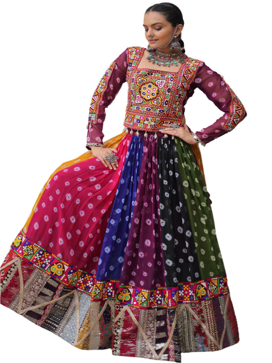 Woman wearing a colorful traditional outfit with a patterned top and multicolored skirt.
