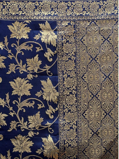 Blue fabric with gold floral and geometric patterns